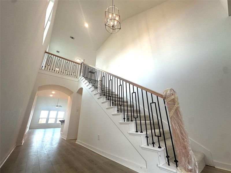 Impress guests when they enter your foyer with 20ft ceiling and open rails on stairs and at game room up.