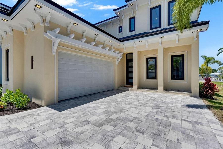 Front exterior of a new home in , Apollo Beach, FL, highlighting curb appeal (Image 1).