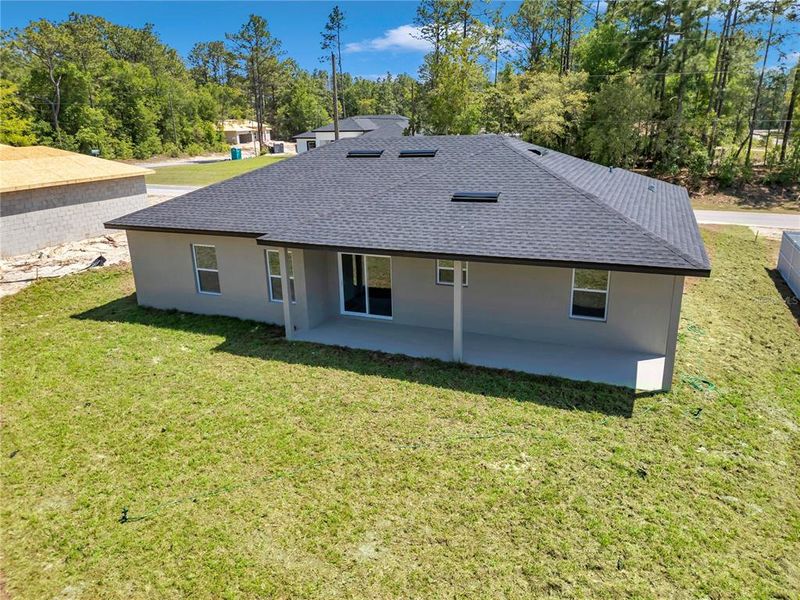 Front exterior of a new home in , Citrus Springs, FL, highlighting curb appeal (Image 16).
