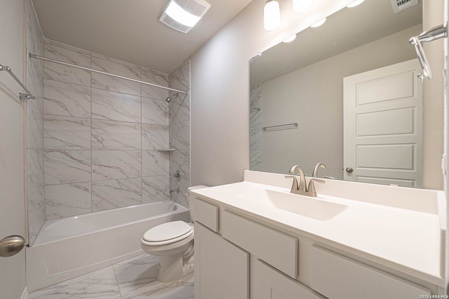 Furnished interior view inside a new home in , Seguin (Image 6).