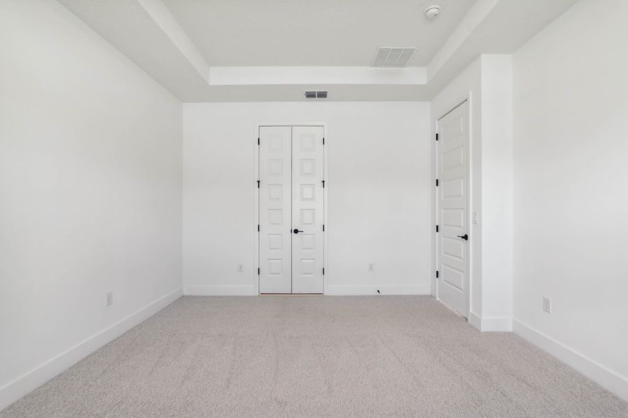 Representative unfurnished interior of a home built from the Hemingway by Rockwell Homes in Northlake At Ovation, Winter Garden (Image 21).