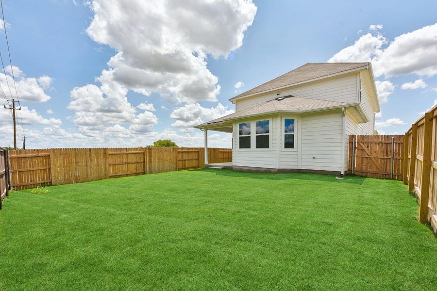 Exterior details and patio area of a home in Edgebrooke, Pflugerville (Image 21).