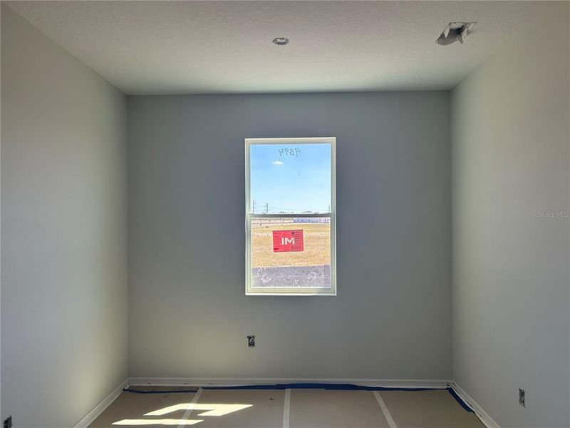 In-progress construction of a new home in Oakfield Trails Traditional, Parrish, FL (Image 31).