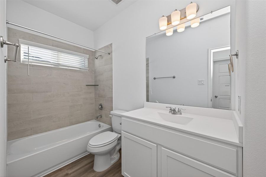 Furnished interior view inside a new home in Enclave at Willis, Willis (Image 8).