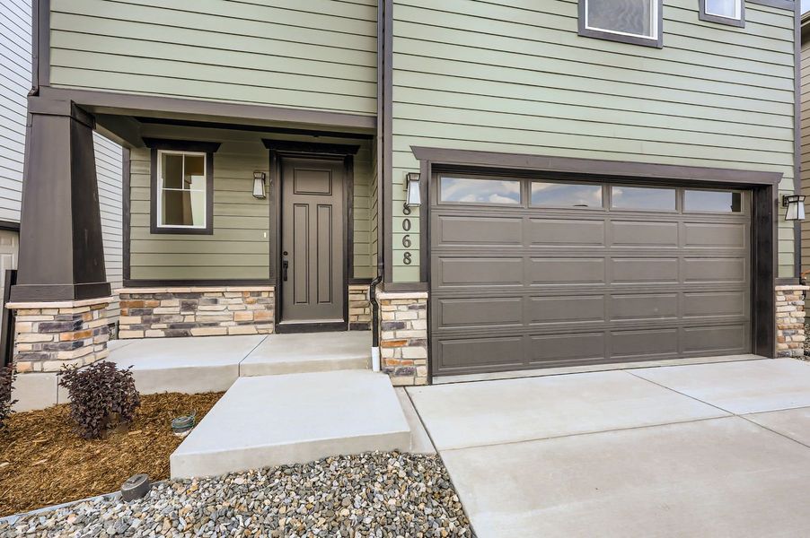 Front exterior of a new home in Sterling Ranch 40s, Colorado Springs, CO, highlighting curb appeal (Image 19).