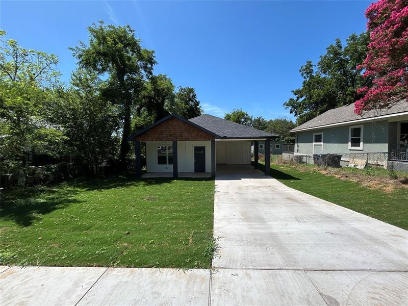 Front exterior of a new home in , Denison, TX, highlighting curb appeal (Image 15). Front exterior of a new home in , Denison, TX, highlighting curb appeal (Image 15).