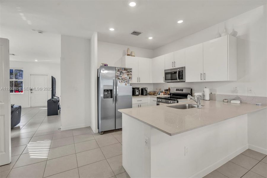 Furnished interior view inside a new home in , Coral Springs (Image 9).