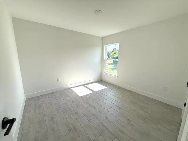 Spacious, unfurnished interior of a new home in Deep Creek, Punta Gorda (Image 21).
