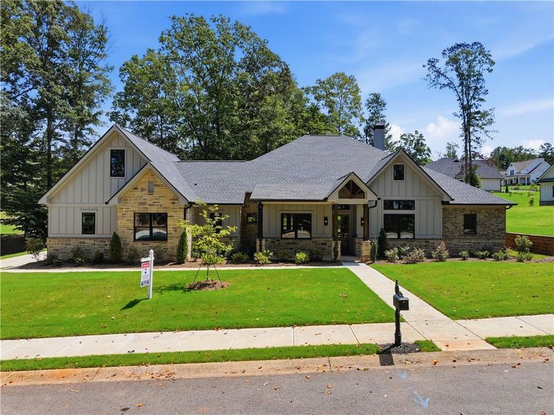Front exterior of a new home in , Commerce, GA, highlighting curb appeal (Image 1). Front exterior of a new home in , Commerce, GA, highlighting curb appeal (Image 1).
