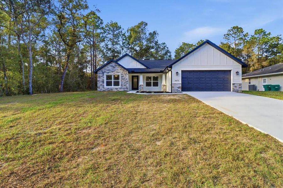 Front exterior of a new home in , Inverness, FL, highlighting curb appeal (Image 2).
