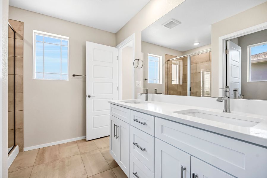 Furnished interior view inside a new home in Barefoot Village, Firestone (Image 5).