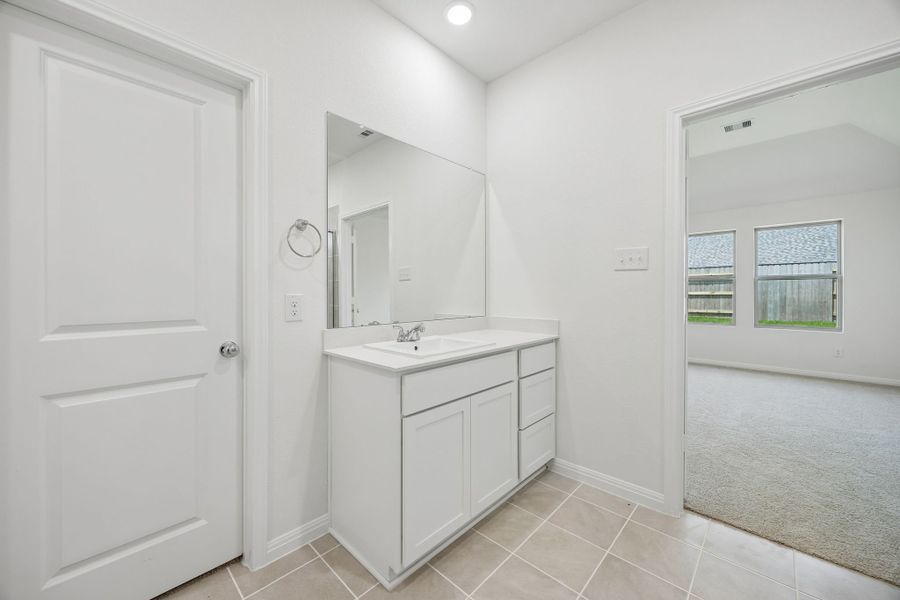 Furnished interior view inside a new home in Riviera Pines, Huffman (Image 11).