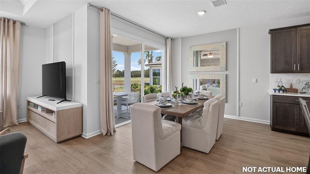 Furnished interior view inside a new home in Sawmill Branch, Palm Coast (Image 17).