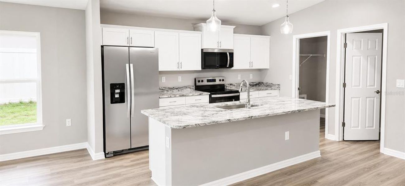 Furnished interior view inside a new home in , Summerfield (Image 6).