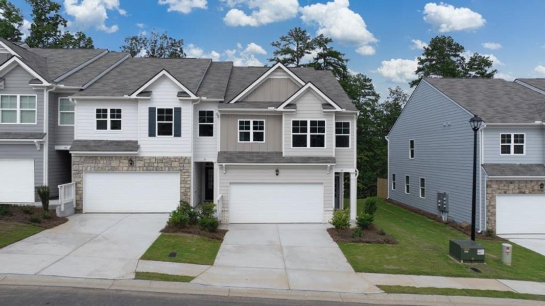 Front exterior of a new home in Mountain Park, Dahlonega, GA, highlighting curb appeal (Image 2). Front exterior of a new home in Mountain Park, Dahlonega, GA, highlighting curb appeal (Image 2).