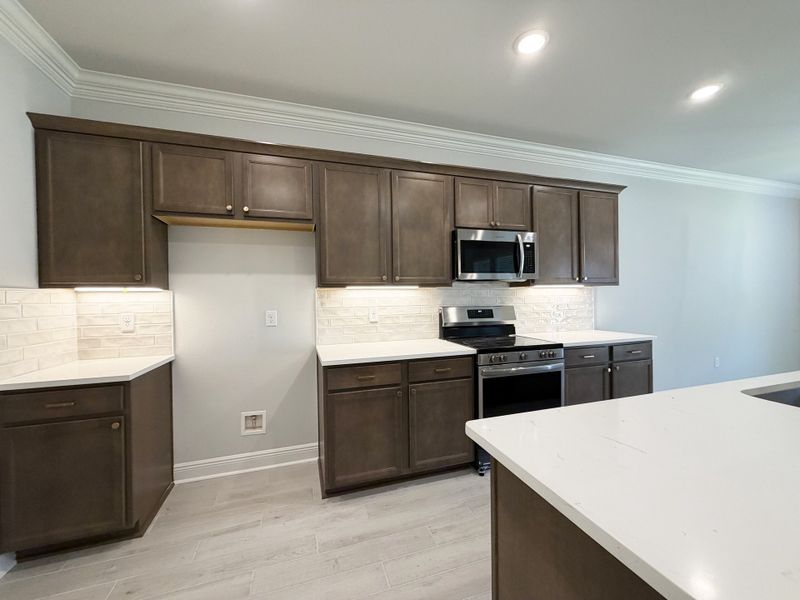 Furnished interior view inside a new home in Natureview, Freeport (Image 6).