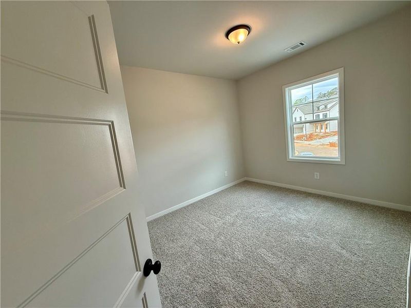 Spacious, unfurnished interior of a new home in Ponderosa Farms Estates, Gainesville (Image 40).