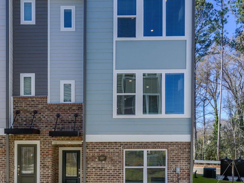 Exterior details and patio area of a home in Central Living at Craig, Charlotte (Image 3). Exterior details and patio area of a home in Central Living at Craig, Charlotte (Image 3).