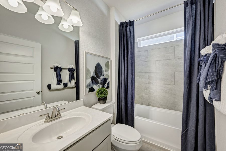 Furnished interior view inside a new home in Maddox Station, Eatonton (Image 4).
