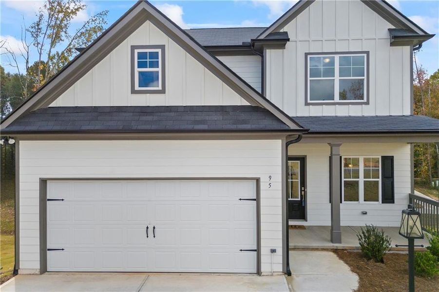 Front exterior of a new home in , Crawford, GA, highlighting curb appeal (Image 21).