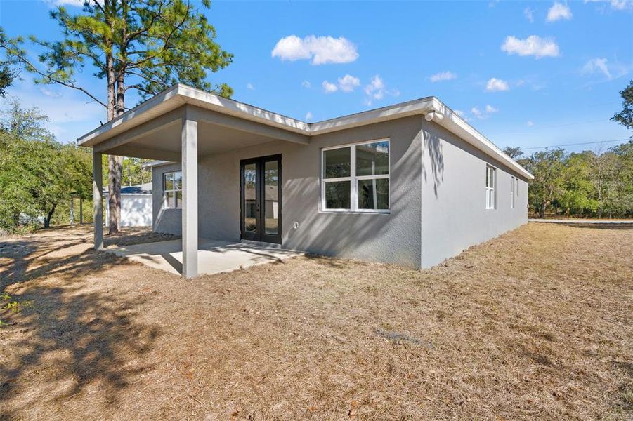 Exterior details and patio area of a home in , Citrus Springs (Image 29).