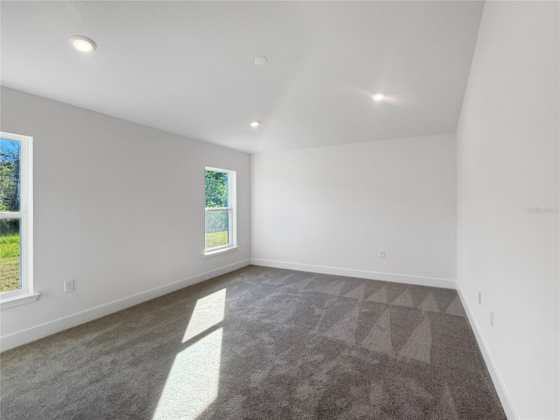 Spacious, unfurnished interior of a new home in Harmony Central, St. Cloud (Image 11).