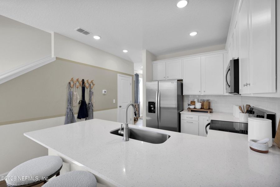 Furnished interior view inside a new home in Baxley Villas, Middleburg (Image 7). Furnished interior view inside a new home in Baxley Villas, Middleburg (Image 7).