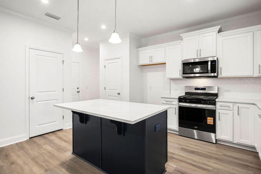 Furnished interior view inside a new home in Salem Bay, Beaufort (Image 6).