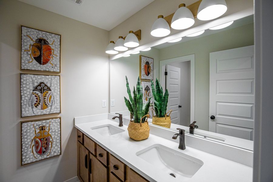 Representative furnished interior of a home built from the Willow by Grant & Co in Manor at Hall Creek, Arlington (Image 97).