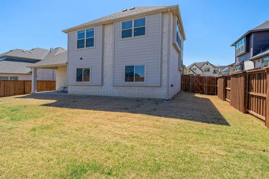 Exterior details and patio area of a home in , Prosper (Image 3). Exterior details and patio area of a home in , Prosper (Image 3).
