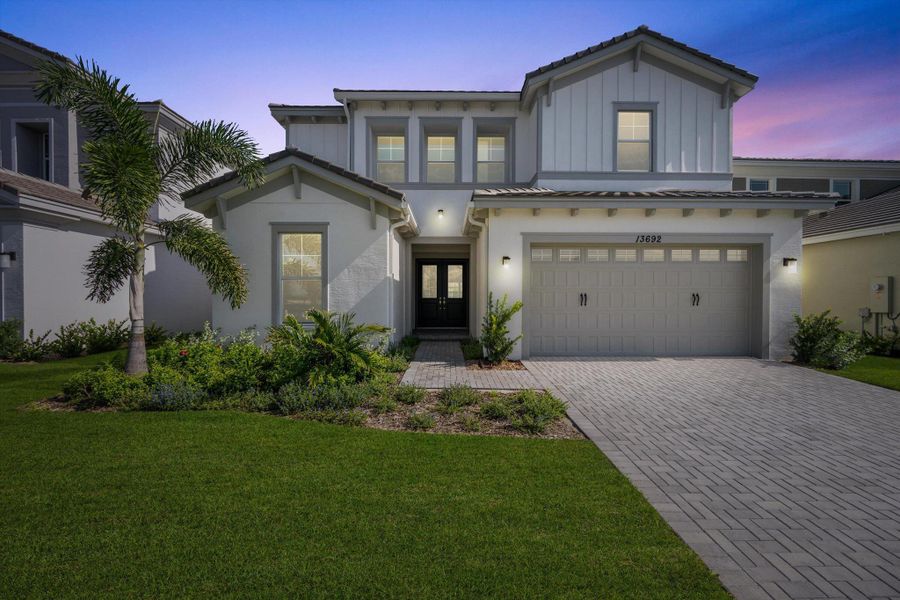 Front exterior of a new home in , Westlake, FL, highlighting curb appeal (Image 30). Front exterior of a new home in , Westlake, FL, highlighting curb appeal (Image 30).