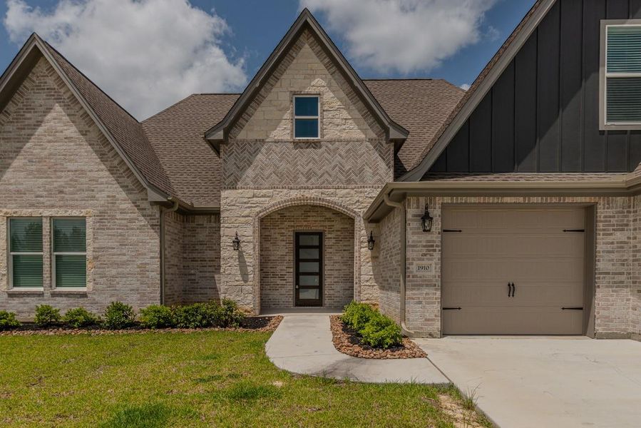 Front exterior of a new home in , Lumberton, TX, highlighting curb appeal (Image 1). Front exterior of a new home in , Lumberton, TX, highlighting curb appeal (Image 1).