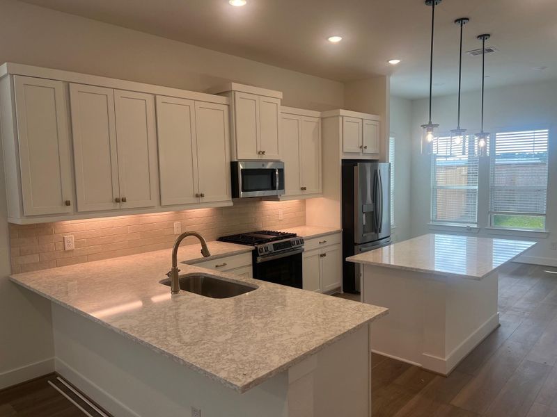 Furnished interior view inside a new home in Wood Leaf Reserve, Tomball (Image 6).