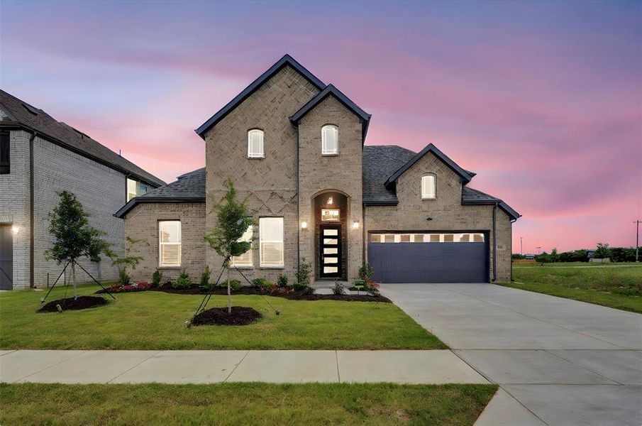 Front exterior of a new home in Polo Ridge, Forney, TX, highlighting curb appeal (Image 2).