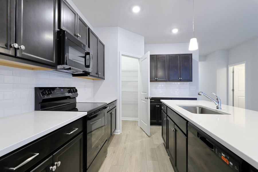 Furnished interior view inside a new home in Hainer Place, Conway (Image 9).