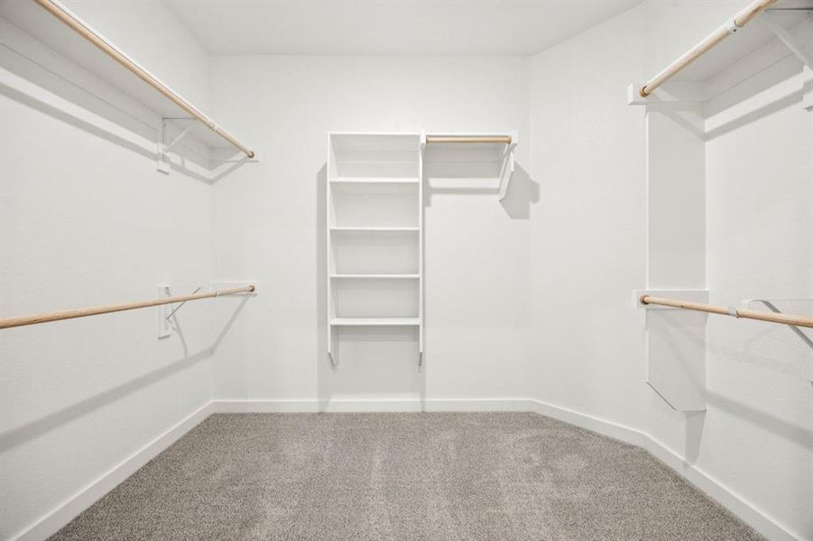 Primary Closet in the Emmy II home plan by Trophy Signature Homes - REPRESENTATIVE PHOTO