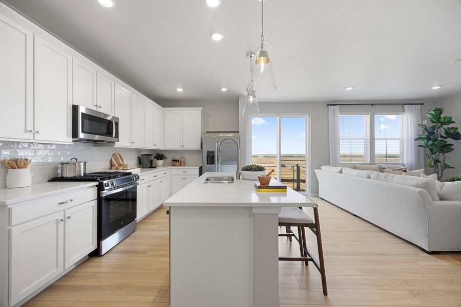 Representative furnished interior of a home built from the 2504 by Risewell Homes in Harvest Crossing, Aurora (Image 11).