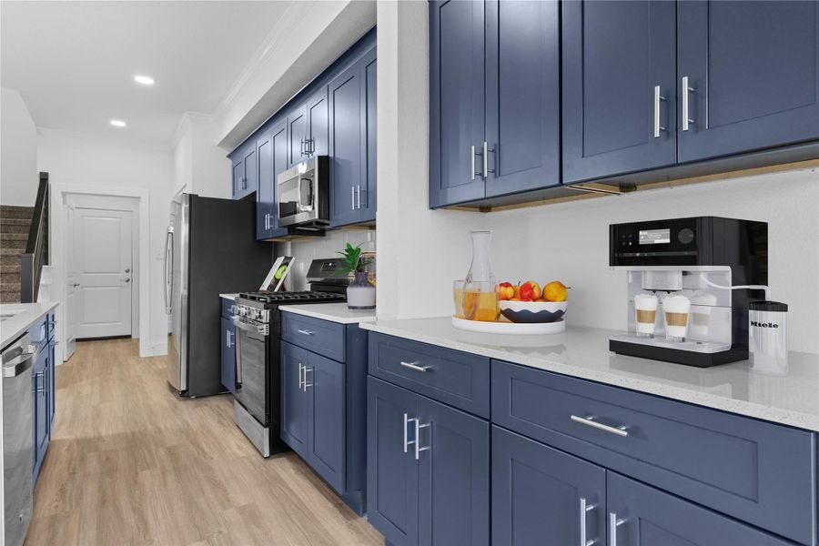 This new home gourmet kitchen has an upgraded stainless steel 5 burner gas range, Built stainless microwave oven.  Look at all the amazing cabinets and countertops that surround you!  Make that call to see this amazing new home minutes away from the lake! * Virtual stage*
