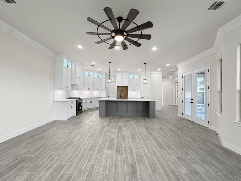 Similar Living Area Open to The Kitchen in a Home Built by TX Best Home Builders Similar Living Area Open to The Kitchen in a Home Built by TX Best Home Builders