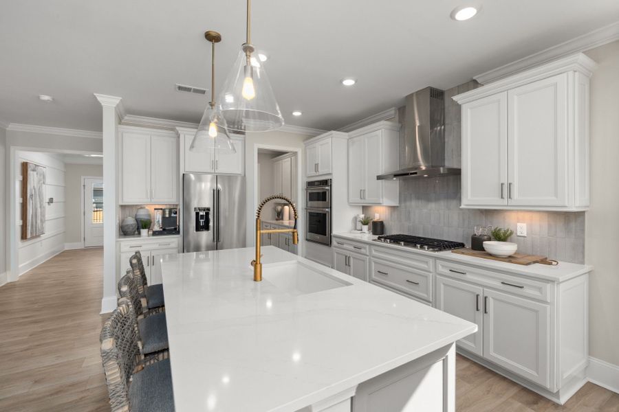 Representative furnished interior of a home built from the Continental by Pulte Homes in Saunders Farm, Fuquay Varina (Image 7).