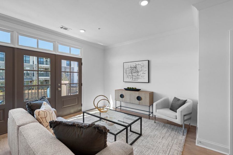 Representative furnished interior of a home built from the The Oleander by The Providence Group in Market Square at Sawnee Village, Cumming (Image 17).