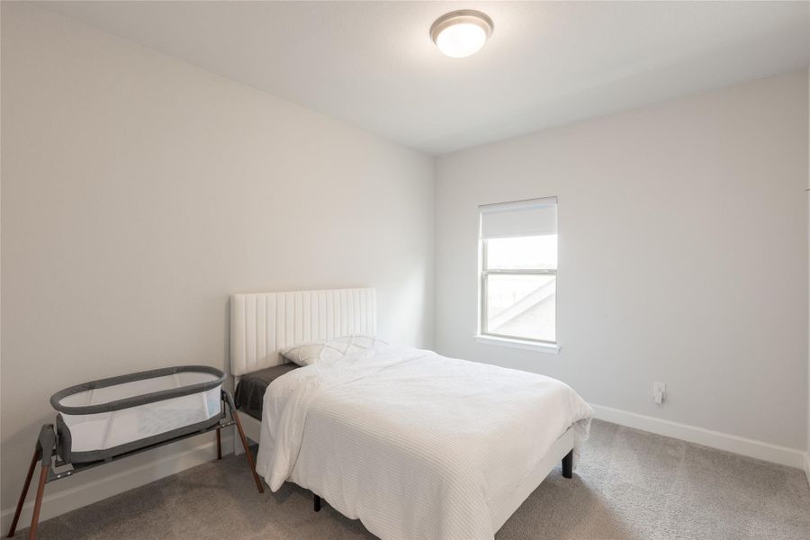 Furnished interior view inside a new home in Elyson, Katy (Image 39).