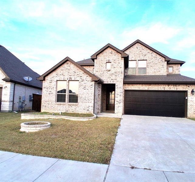 Front exterior of a new home in , Royse City, TX, highlighting curb appeal (Image 2).