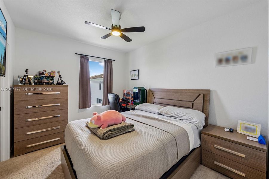 Furnished interior view inside a new home in Messina Place, Homestead (Image 10).