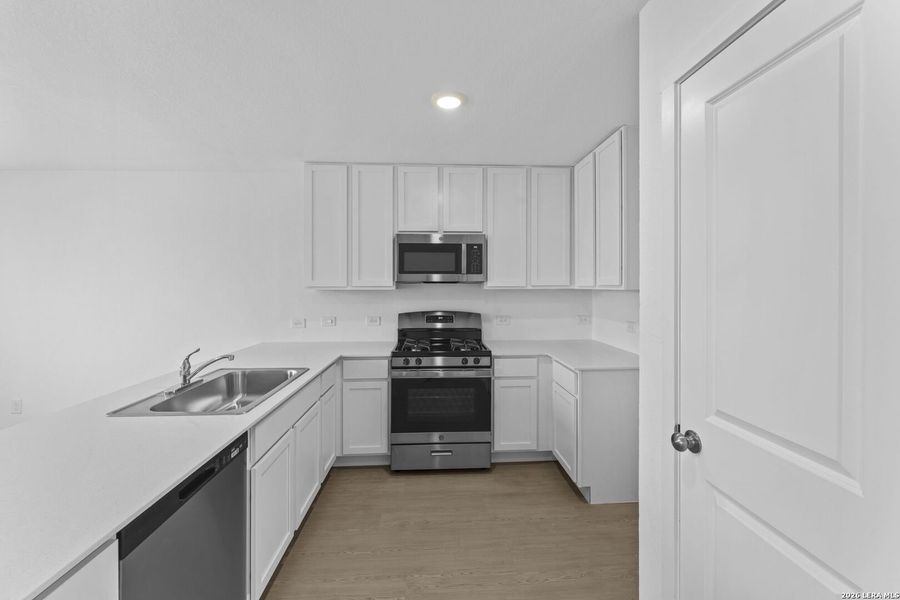 Furnished interior view inside a new home in Spring Grove, St. Hedwig (Image 7).