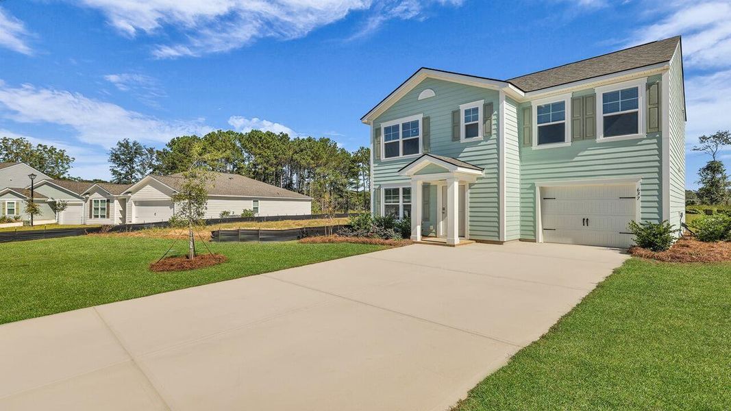 Front exterior of a new home in Center Pointe, Santee, SC, highlighting curb appeal (Image 2).