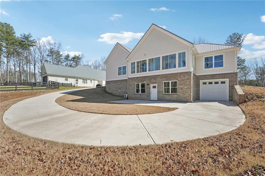 Front exterior of a new home in , Canton, GA, highlighting curb appeal (Image 34).