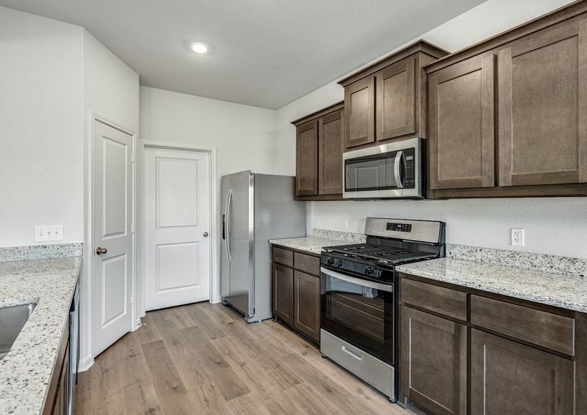 The kitchen has beautiful granite countertops.