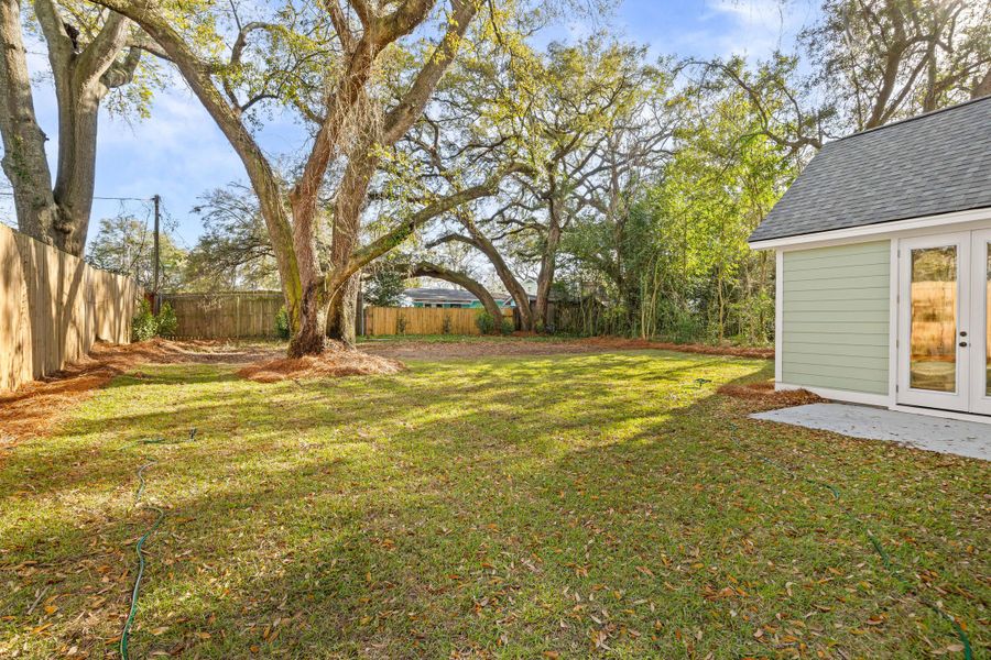 Exterior details and patio area of a home in Park Circle Single Family Homes, North Charleston (Image 4).