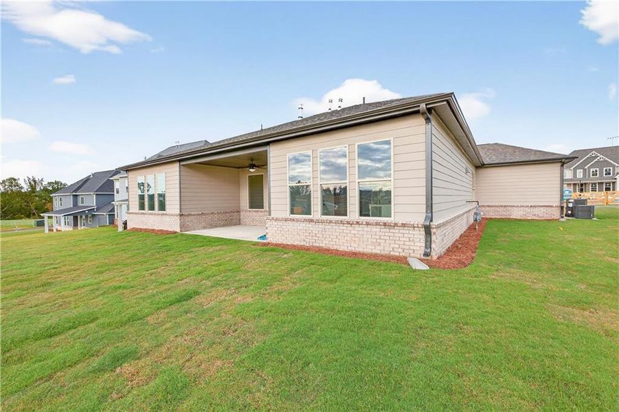 Exterior details and patio area of a home in The Manor at Gainesville Township, Gainesville (Image 4).